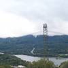 Views of Lexington Reservoir and Highway 17 are obscured by power lines that cut through the open space.