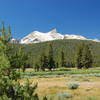 Looking across the meadow at distant peaks.