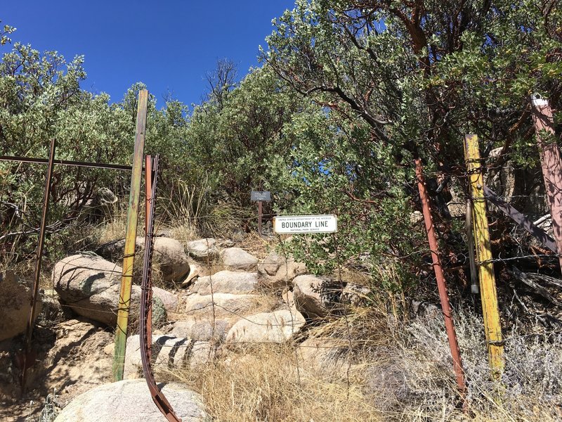 As you enter Saguaro NP, the trail climbs through a boulder field. There is also a registry at this point.