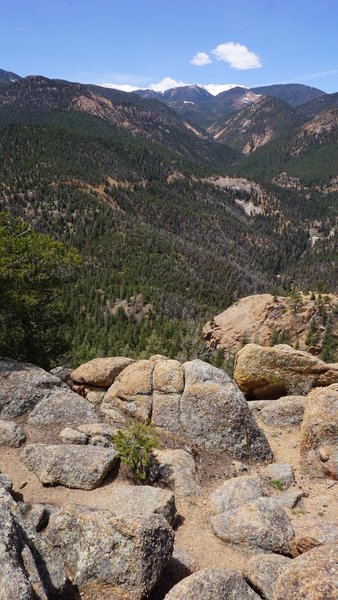 View looking west from the top of Mt. Muscoco with a sneak peek of snow capped mountains in the distance.