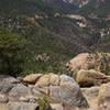 View looking west from the top of Mt. Muscoco with a sneak peek of snow capped mountains in the distance.