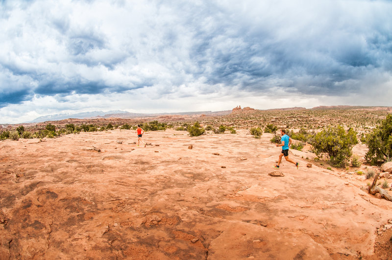 Slickrock trails with views of the La Sals.