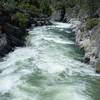During a water release in the spring, the Tuolumne River roars downstream.