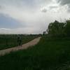 A biker along the paved South Boulder Creek Trail.