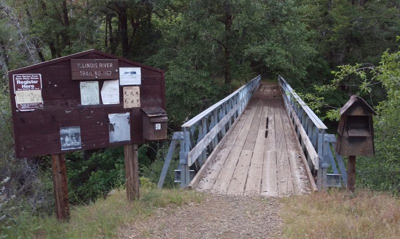 Briggs Creek bridge and Illinois River Trail #1161 trailhead. Permit boxes have no permits and no bottoms!