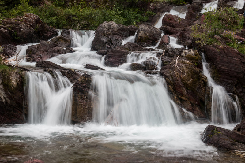 Watching the Redrock Falls rush towards the lake.