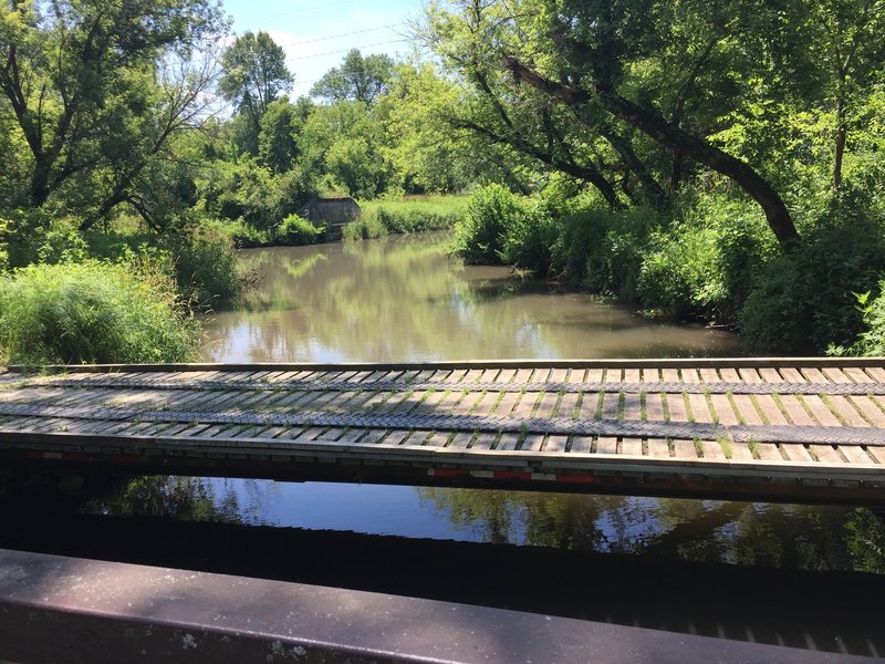 Footbridge on the North Shore Trail over Mill Creek which pours into Lake MacBride.