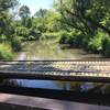 Footbridge on the North Shore Trail over Mill Creek which pours into Lake MacBride.