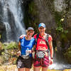 Runners stop below Wairere Falls Buried Village.