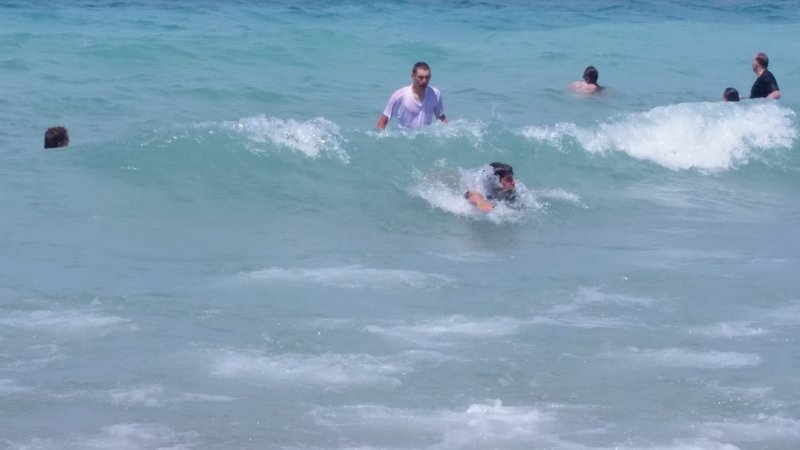 Visitors take a rewarding swim in Lake Michigan.