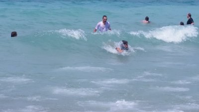 Visitors take a rewarding swim in Lake Michigan.
