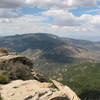 The rocky summit of Rincon Peak rises out of ponderosa pine forests.