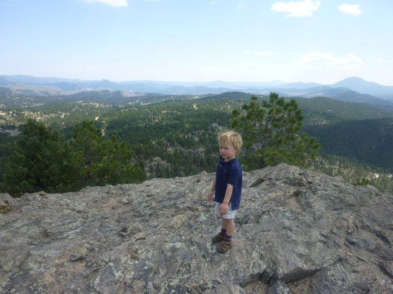 Oscar taking in beautiful summit views.