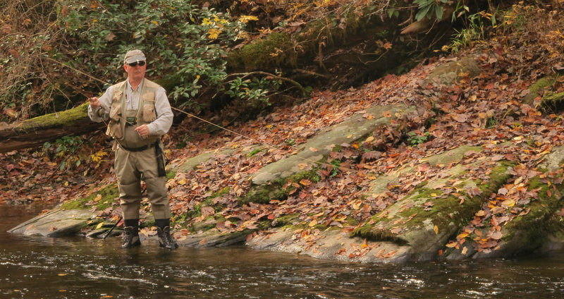 A fly fisherman trying to rip some lips on Indian Creek.