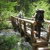 Hikers crossing the Salmon River on Jackpot Meadows Trail.  Photo by Daniel Sanderman