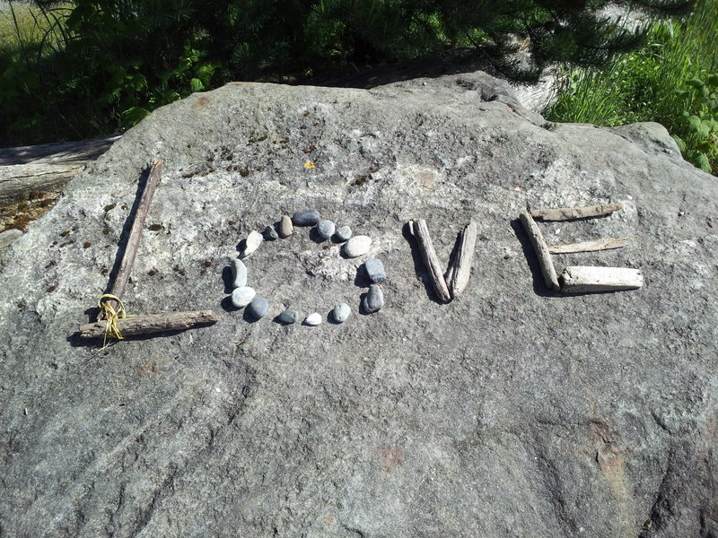 Keep an eye out for this sign on the big rock along this path built out of nearby materials. :) If it's not there - make it!