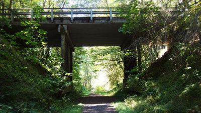 The bridge carrying Scappoose-Vernonia Highway. Continue underneath on the Columbia Forest Road to reach Vernonia.