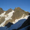 View to Three Fingers Lookout (center peak, whitish) from about Tin Can Gap.