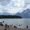 Visitors enjoy Jackson Lake as the Grand Teton defines the horizon.