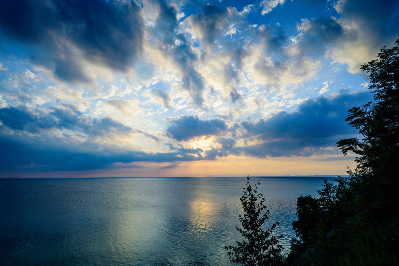 Catching the sunrise on a bluff overlooking Lake Michigan.