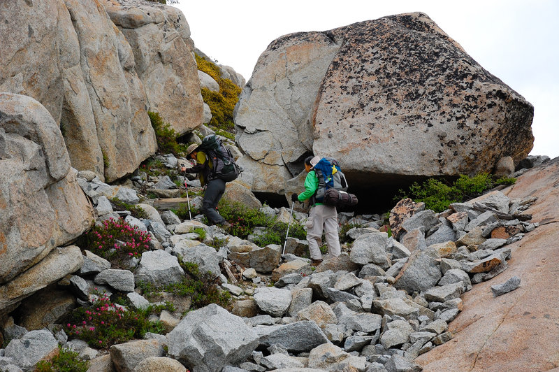 Navigating a rocky section of trail.