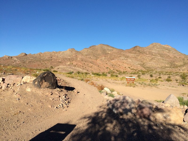 Trailhead with Sloan Canyon sign in the background.