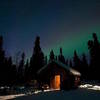 Aurora Borealis dancing above the Savage Cabin, Denali National Park. Photo credit: NPS.