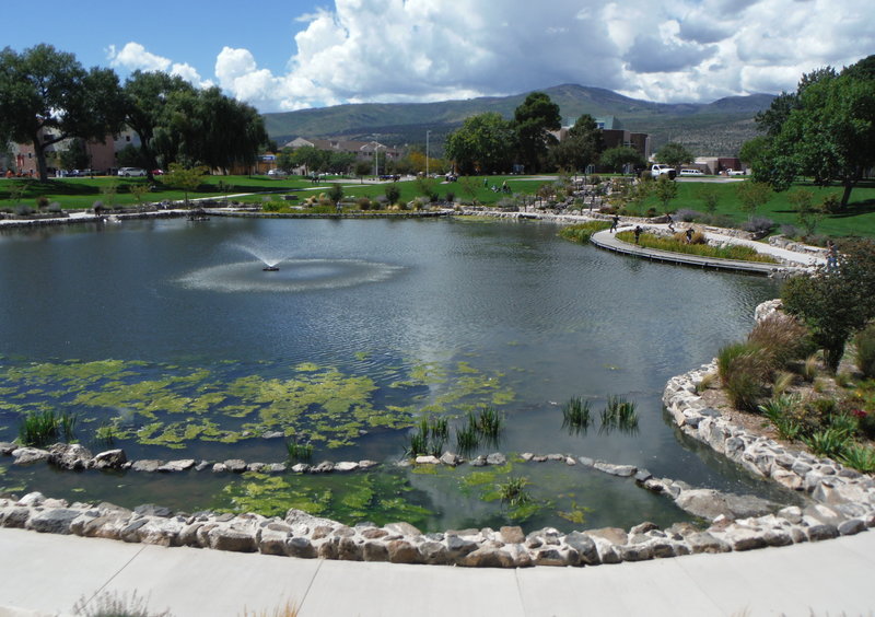 View of Ashley Pond and park looking west towards Pajarito Mountain.