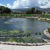 View of Ashley Pond and park looking west towards Pajarito Mountain.