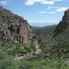 View of the Truchas Peaks in the Sangre de Cristo Mountains looks east down Guaje Canyon.