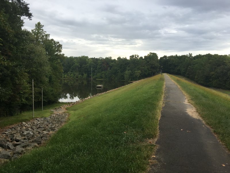 Trail crossing Mercer Lake Dam at eastern edge of lake.