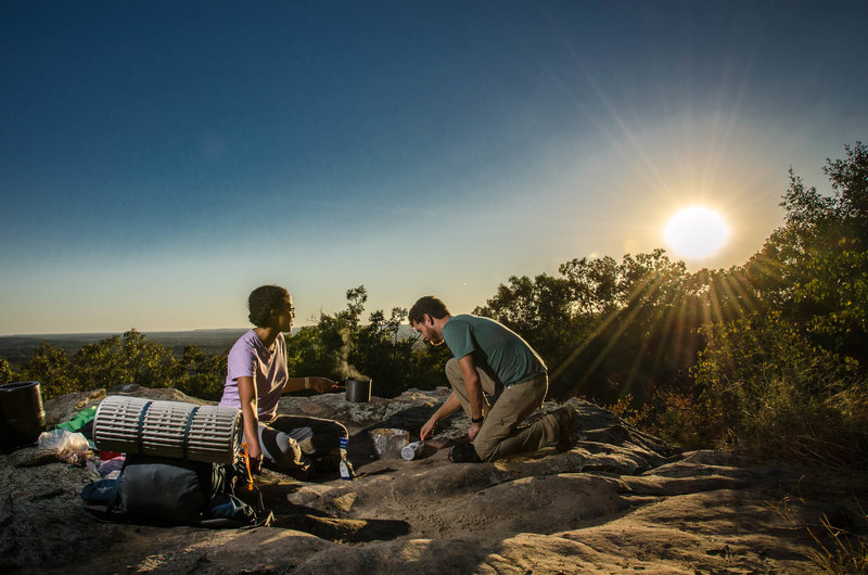 Cooking dinner and taking in the view at sunset at Buzzard Point.