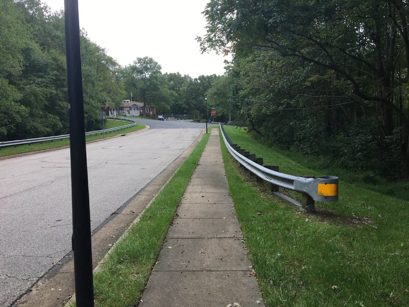 Sidewalk along Rushing Creek Drive headed southeast towards Southrun Road.