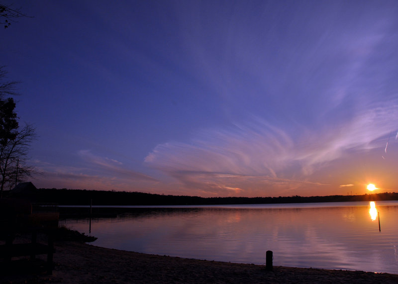 A sunset and sundog over Lake Crabtree.