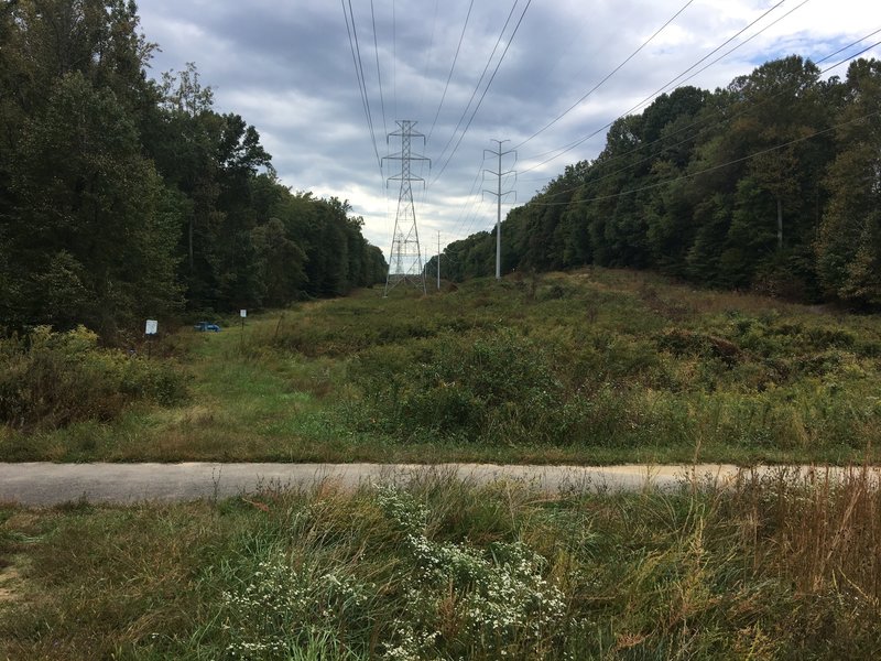 South Run Stream Valley Trail running across right of way for high tension power lines.