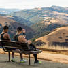 Taking a breather on the bench in Sierra Vista OSP Parking Lot.