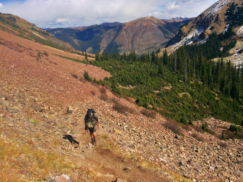 Crossing boulder fields before the final ascent to Cathedral Lake.