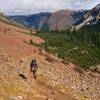 Crossing boulder fields before the final ascent to Cathedral Lake.