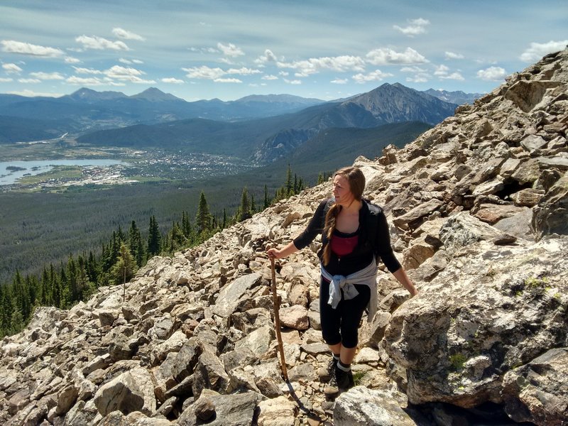 Taking a short break in the midst of the huge boulder field. Dillon Reservoir glitters in the distance.