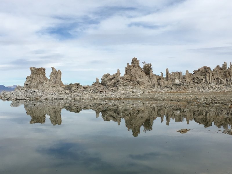 Tufa reflected on the lake.