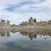 Tufa reflected on the lake.