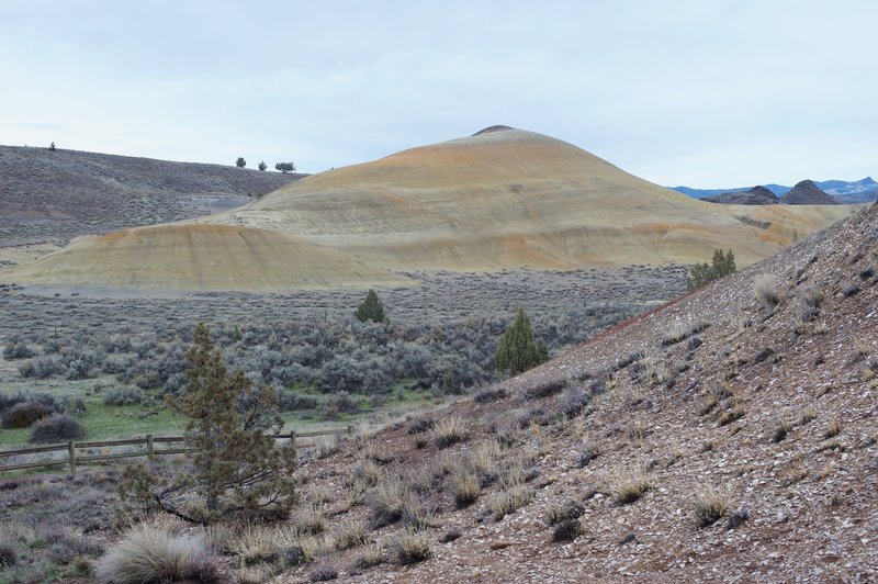 A better view of the surrounding hills come into view as the trail climbs behind the fossil hill.