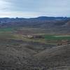 Views of a farm outside the monument boundary can be enjoyed from the trail.  Cattle, hay, and irrigation fields can be seen from here.