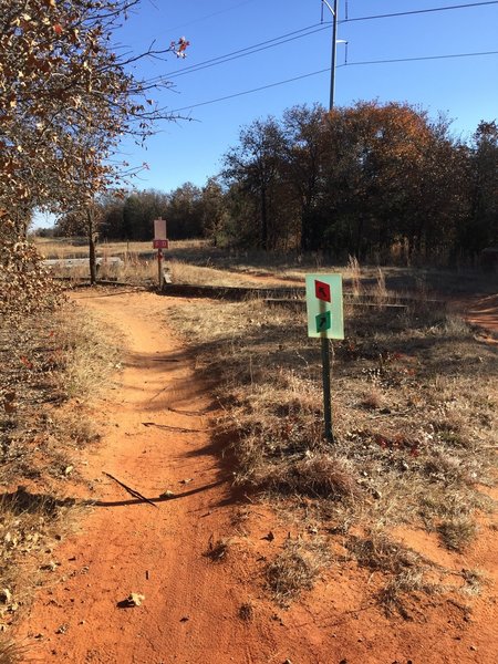 You are done with the blue trail. Follow the signs back to the green trail - do not take the red trail.