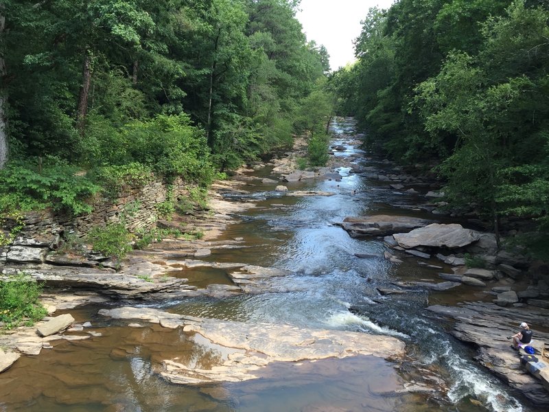 View of Sope Creek from the bridge crossing along Paper Mill Road. There are ruins on both sides here which can be accessed by the trail.