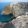 Facing the eastern part of the bay, down into the sea cave.