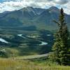 The meandering Bow River and craggy, yet stunning Sundance Peak present an incredible backdrop to any adventure along Cory Pass in Banff, Alberta.