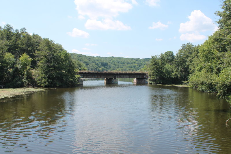 This is the train track bridge as seen from the pedestrian bridge on the Laura Trail.