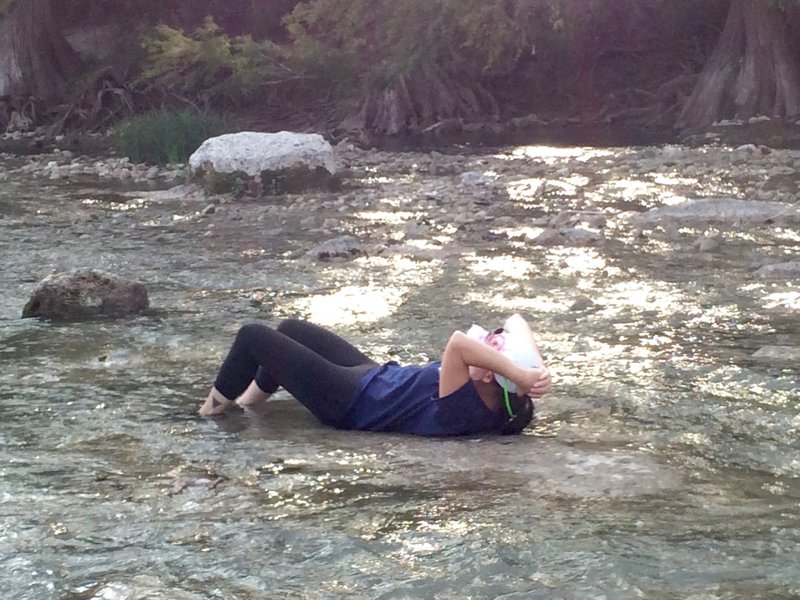 Taking a break to relax in the warm water at Guadalupe River State Park.