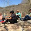 Hikers enjoy a snack by the Big South Fork Cumberland River.